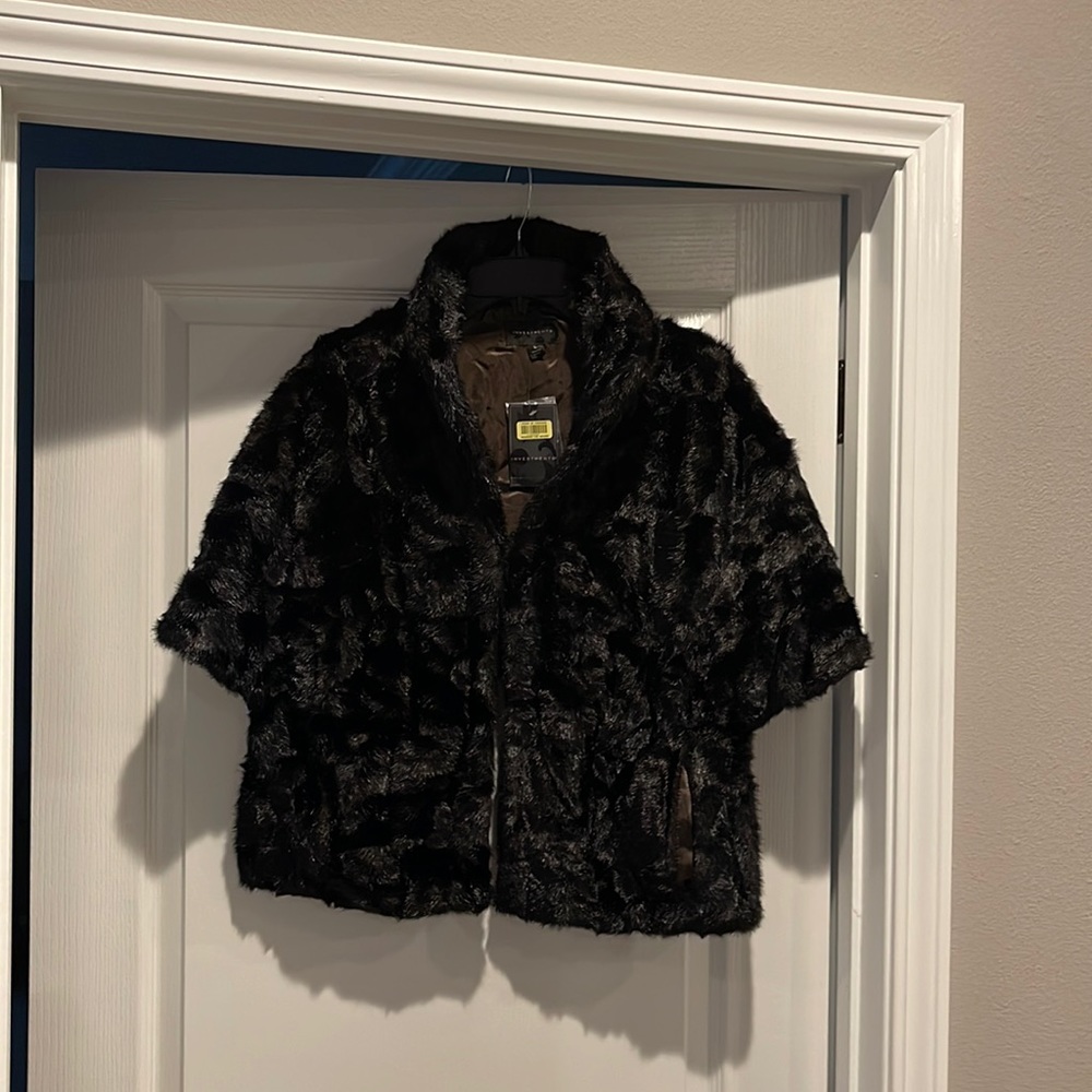 Beautiful black faux fur, NWT, Great for evening wear.
